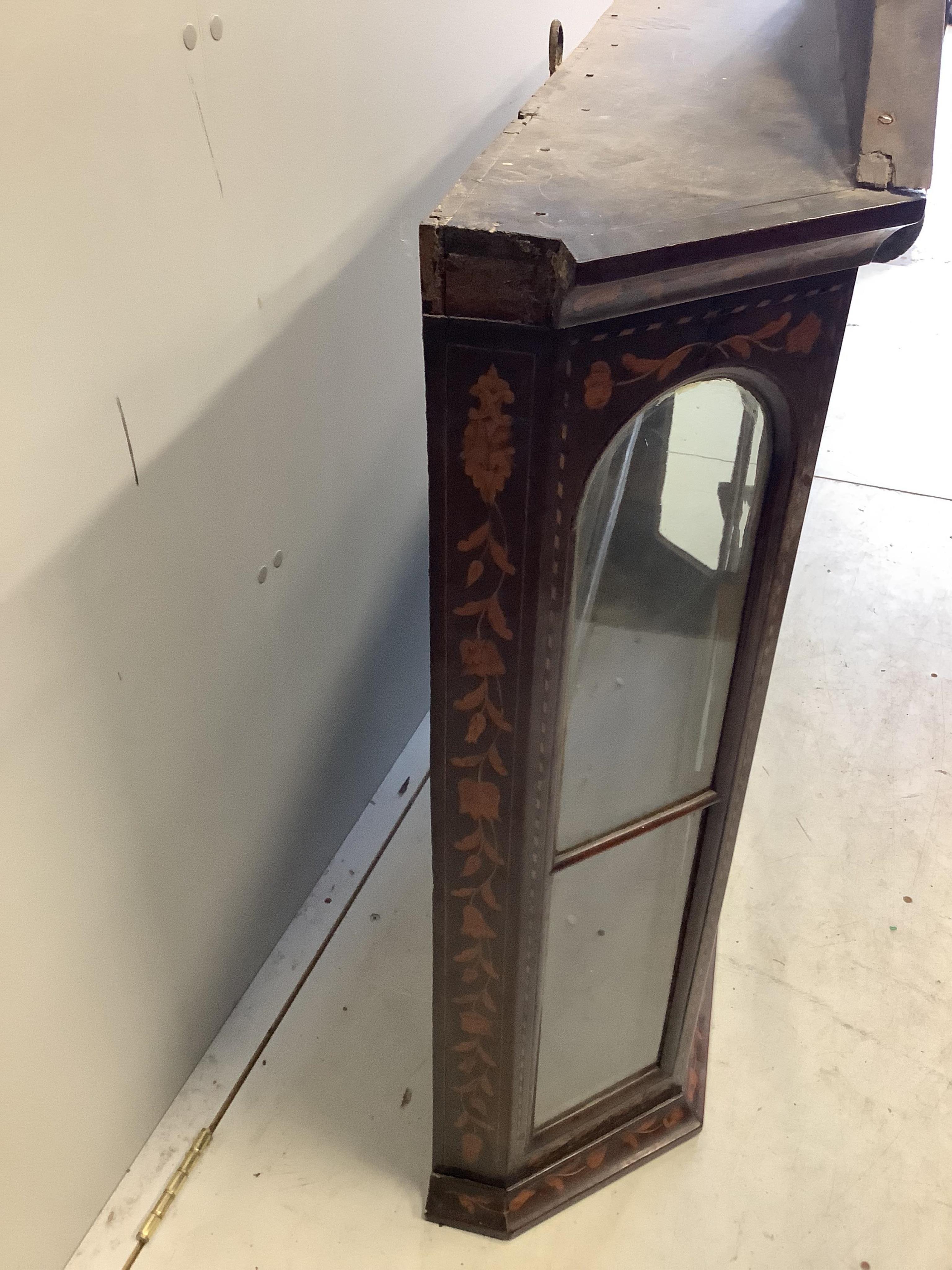 An early 19th Dutch floral marquetry inlaid walnut wall cabinet, (locked,no key), width 110cm, depth 24cm, height 97cm. Condition - fair